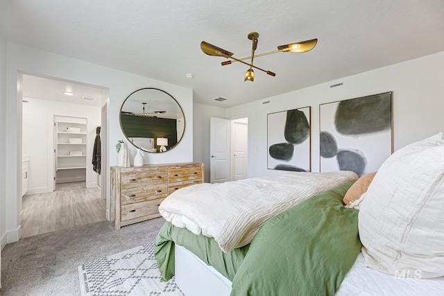 8002 W Fern St, Eagle, ID 83616 - bedroom with carpet, a chandelier, and baseboards