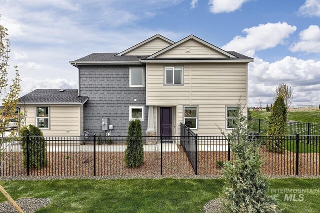8002 W Fern St, Eagle, ID 83616 - back of property with roof with shingles and a patio area