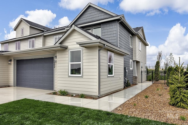 8002 W Fern St, Eagle, ID 83616 - view of side of property with an attached garage and concrete driveway