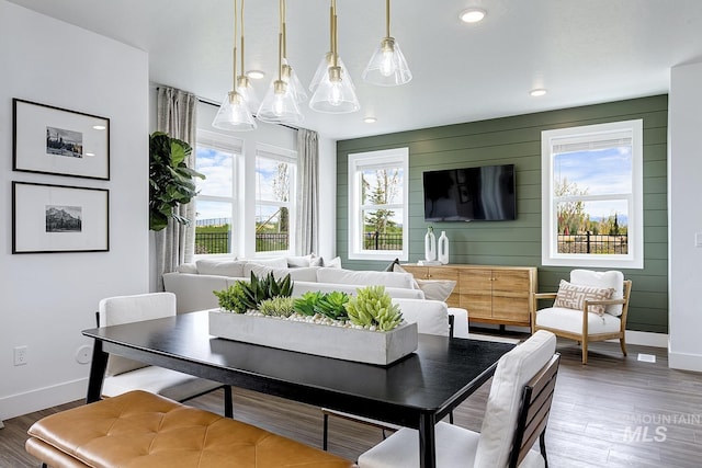 8002 W Fern St, Eagle, ID 83616 - dining space featuring baseboards, wood finished floors, and recessed lighting