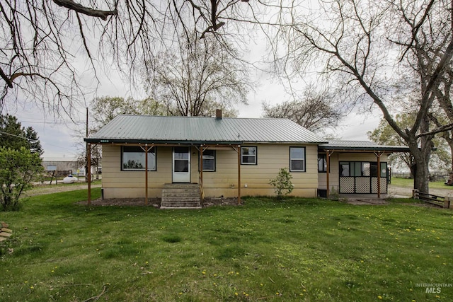 8970 Hurd Ln With 7, Acres, Payette, ID 83661 - back of house with metal roof and a yard