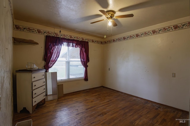8970 Hurd Ln With 7, Acres, Payette, ID 83661 - unfurnished bedroom featuring wood finished floors, baseboards, and a ceiling fan