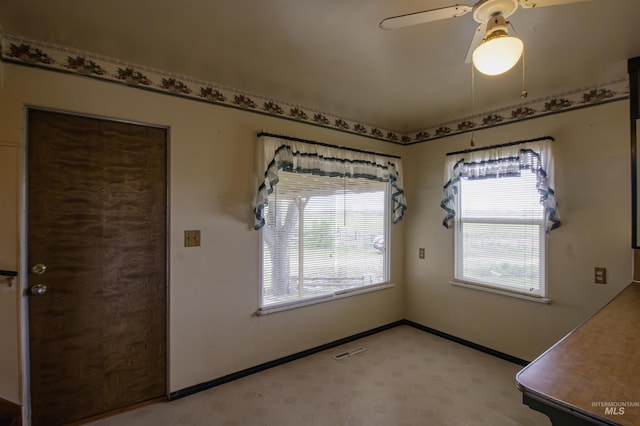 8970 Hurd Ln With 7, Acres, Payette, ID 83661 - unfurnished dining area featuring baseboards and ceiling fan