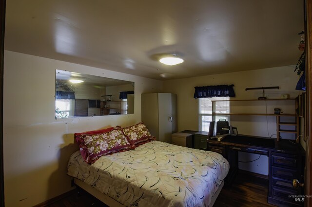 8970 Hurd Ln With 7, Acres, Payette, ID 83661 - bedroom with dark wood-style floors