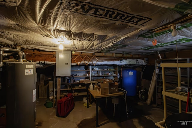 8970 Hurd Ln With 7, Acres, Payette, ID 83661 - unfinished basement featuring water heater, a water pressure tank, and electric panel