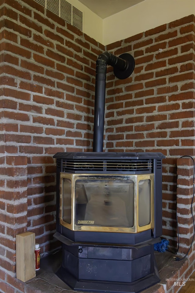 8970 Hurd Ln With 7, Acres, Payette, ID 83661 - detailed view of a wood stove and brick wall