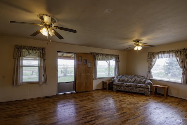 8970 Hurd Ln With 7, Acres, Payette, ID 83661 - living area featuring a ceiling fan and wood finished floors
