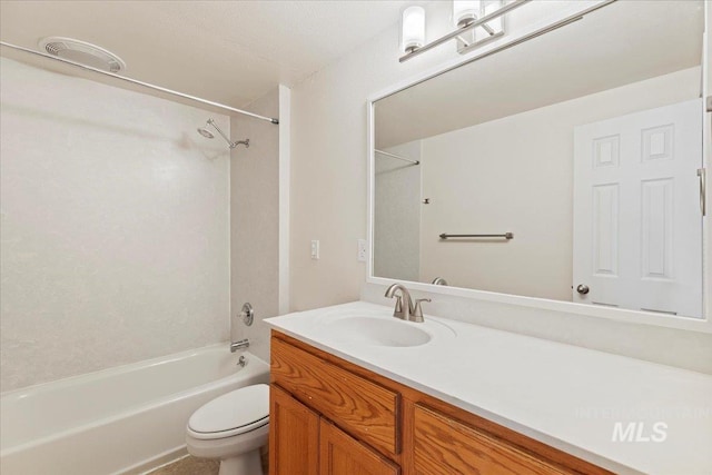 full bathroom with vanity, toilet, and  shower combination