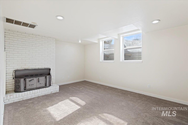 unfurnished living room featuring carpet