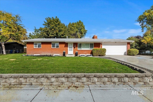 ranch-style home featuring a front yard and a garage