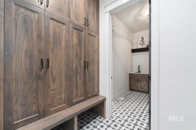 mudroom featuring baseboards