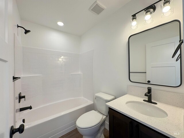 TBD Idaho, Caldwell, ID 83605 - full bathroom featuring vanity, tub / shower combination, and wood finished floors