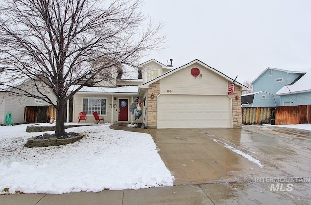 view of front of property with a garage