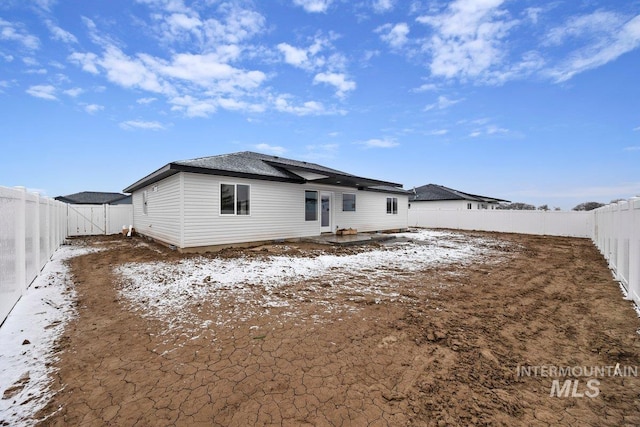 back of house with a patio area and a fenced backyard