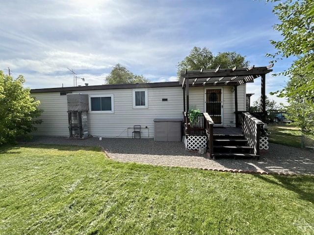 2934 SW Smith Rd, Mountain Home, ID 83647 - back of property featuring a pergola and a lawn