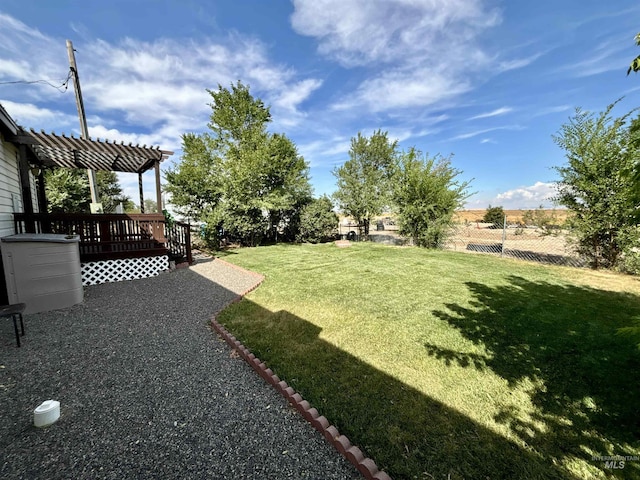 2934 SW Smith Rd, Mountain Home, ID 83647 - view of yard with a wooden deck and a pergola