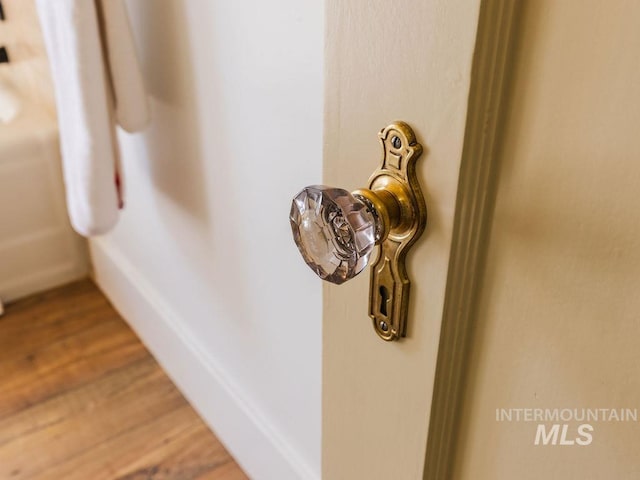 details featuring wood finished floors