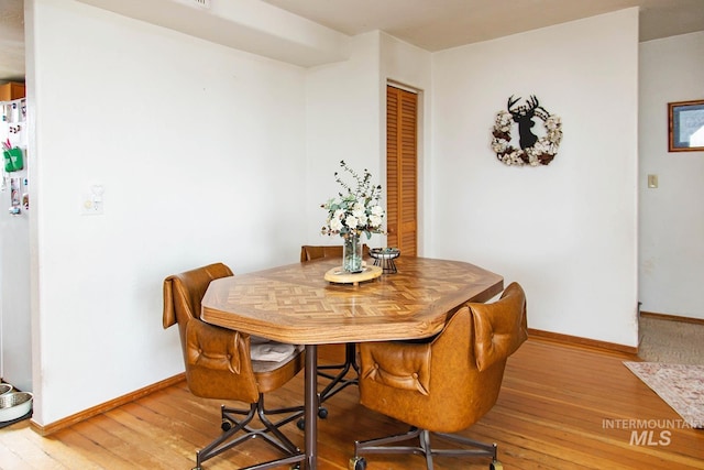 134 Maple Ave, Hansen, ID 83334 - dining area featuring light wood-style floors and baseboards