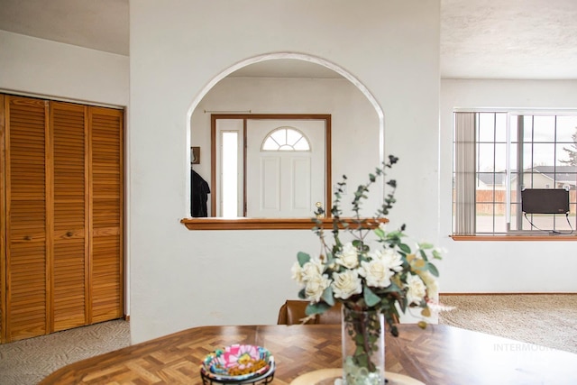 134 Maple Ave, Hansen, ID 83334 - dining space featuring carpet floors and arched walkways