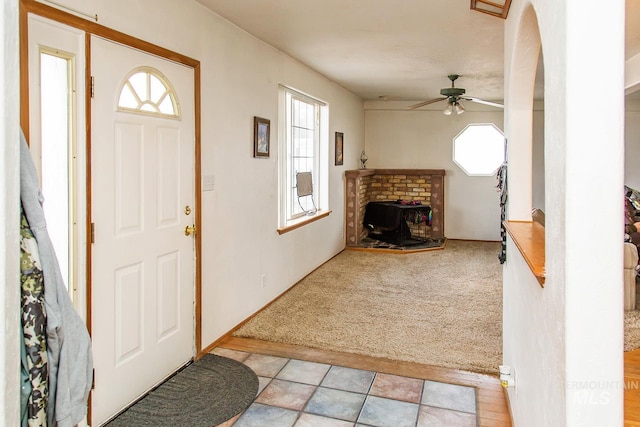 134 Maple Ave, Hansen, ID 83334 - foyer with healthy amount of natural light, light carpet, and a ceiling fan
