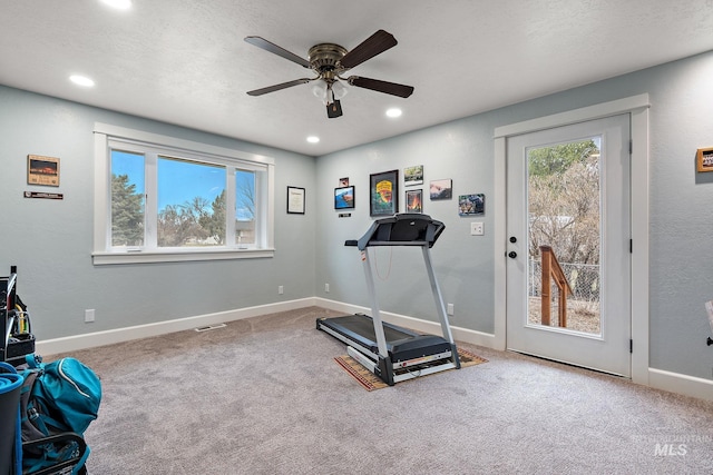 exercise room featuring recessed lighting, visible vents, carpet floors, and baseboards