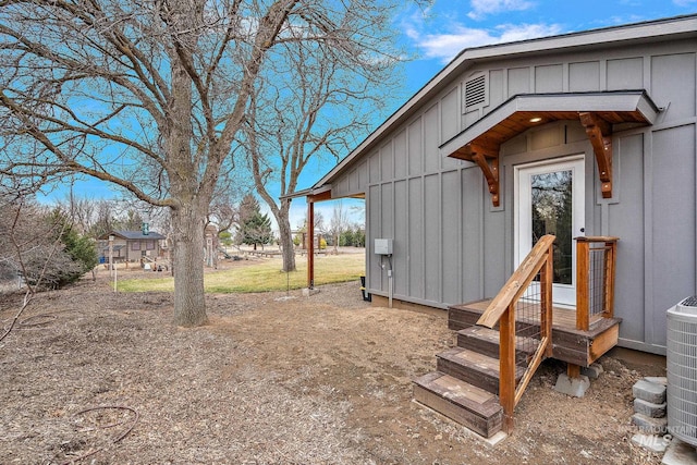 exterior space featuring central AC unit