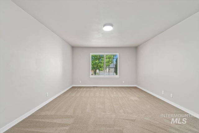 6472 S Liveoak Pl, Boise, ID 83716 - carpeted empty room featuring baseboards