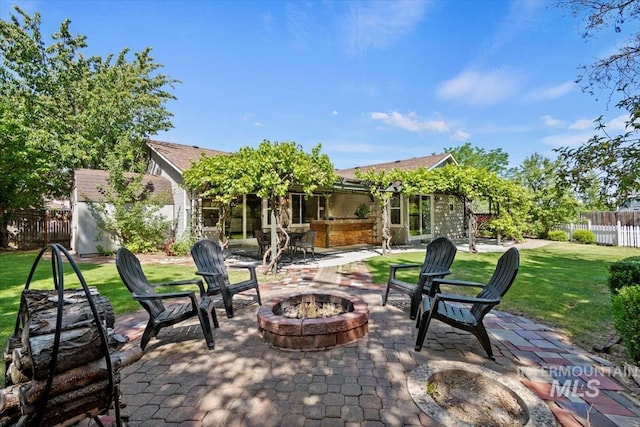 6472 S Liveoak Pl, Boise, ID 83716 - view of patio / terrace with a fire pit