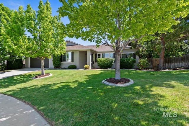 6472 S Liveoak Pl, Boise, ID 83716 - ranch-style house featuring a garage and driveway
