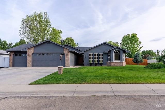 12281 W Norway St, Boise, ID 83713 - ranch-style home featuring a garage, driveway, and brick siding