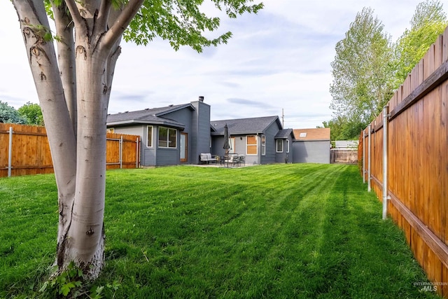 12281 W Norway St, Boise, ID 83713 - view of yard with a patio area