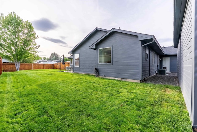 12281 W Norway St, Boise, ID 83713 - rear view of property featuring central AC