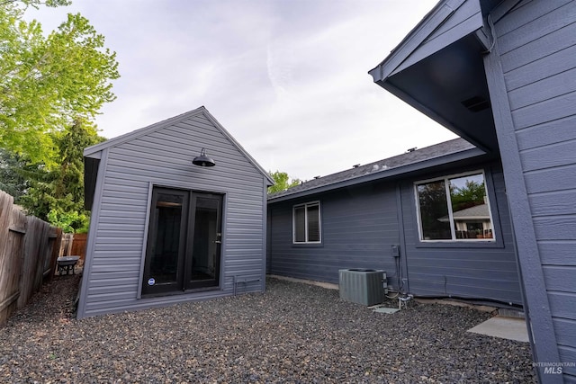 12281 W Norway St, Boise, ID 83713 - rear view of property featuring an outdoor structure and central AC unit