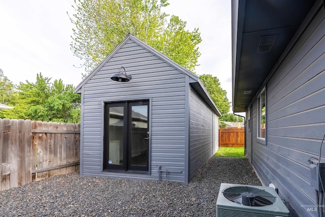 12281 W Norway St, Boise, ID 83713 - view of outbuilding with central air condition unit and a fenced backyard