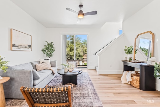 2919 W Jordan Unit 2, Boise, ID 83702 - living room with stairs, light wood-type flooring, a ceiling fan, and baseboards