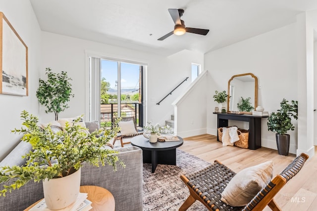 2919 W Jordan Unit 2, Boise, ID 83702 - living area with stairs, wood finished floors, ceiling fan, and baseboards