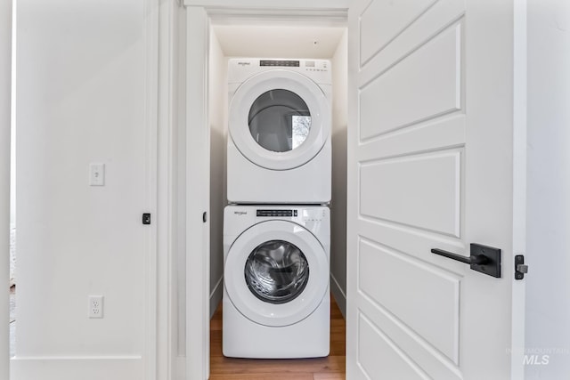 2919 W Jordan Unit 2, Boise, ID 83702 - laundry area featuring stacked washing machine and dryer and wood finished floors