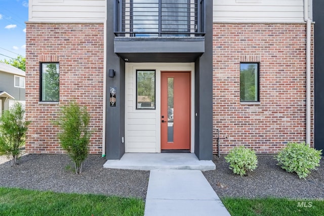 2919 W Jordan Unit 2, Boise, ID 83702 - entrance to property featuring a balcony and brick siding