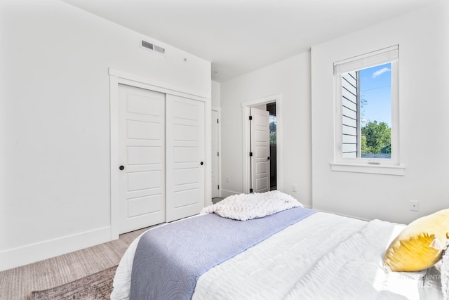 2919 W Jordan Unit 2, Boise, ID 83702 - bedroom with a closet, baseboards, and carpet floors