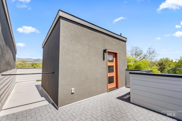 2919 W Jordan Unit 2, Boise, ID 83702 - view of property exterior with a balcony and stucco siding