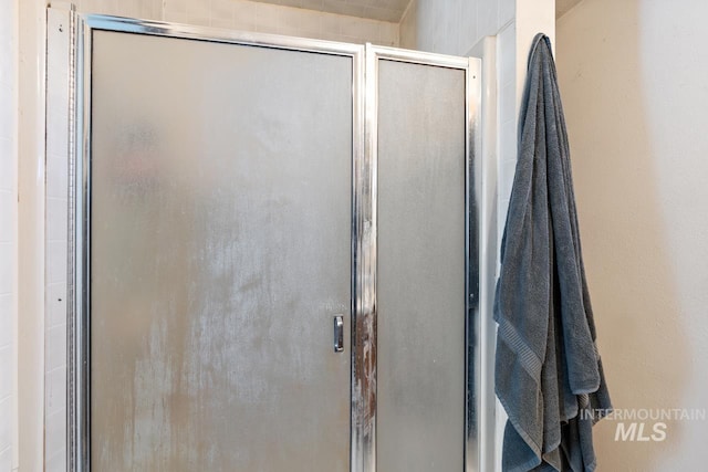 bathroom with an enclosed shower