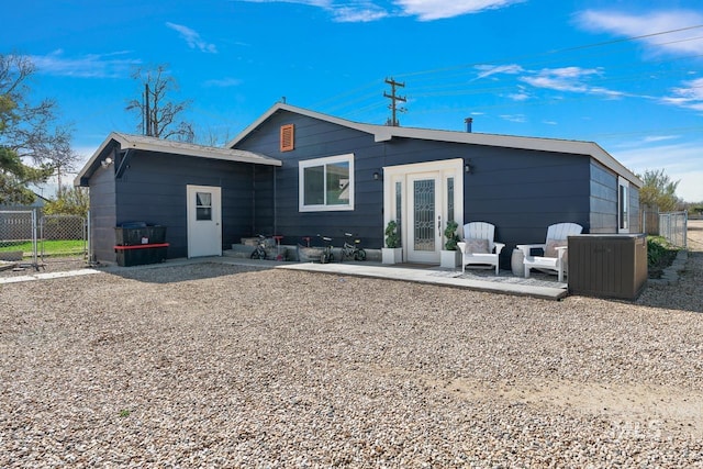 back of house featuring a patio