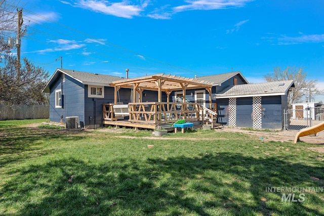 back of house featuring a pergola, a wooden deck, a lawn, and cooling unit