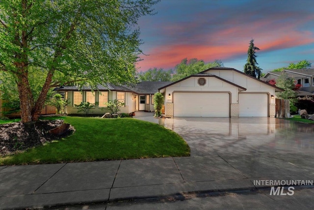 1825 E Seaside Ct, Boise, ID 83706 - single story home with an attached garage, driveway, brick siding, and a front yard