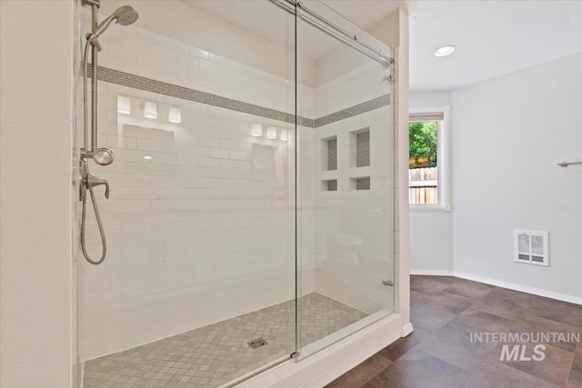1825 E Seaside Ct, Boise, ID 83706 - full bathroom featuring a stall shower, baseboards, and recessed lighting