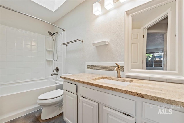 1825 E Seaside Ct, Boise, ID 83706 - bathroom with toilet, vanity, tub / shower combination, and a skylight