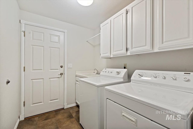 1825 E Seaside Ct, Boise, ID 83706 - laundry room with separate washer and dryer, baseboards, and cabinet space