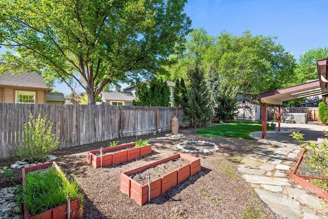 1825 E Seaside Ct, Boise, ID 83706 - fenced backyard featuring a garden, an outbuilding, and a patio area
