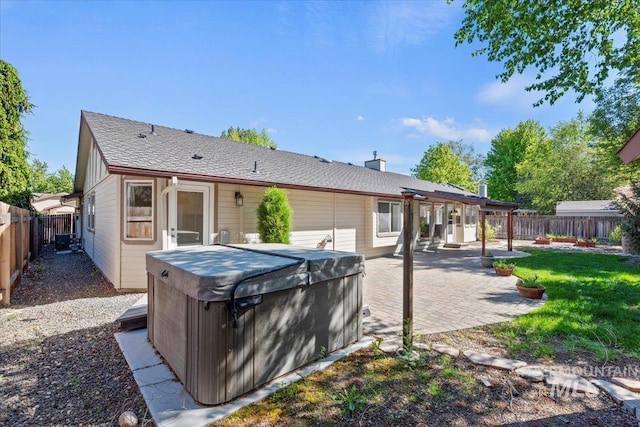 1825 E Seaside Ct, Boise, ID 83706 - back of property with a hot tub and a patio area