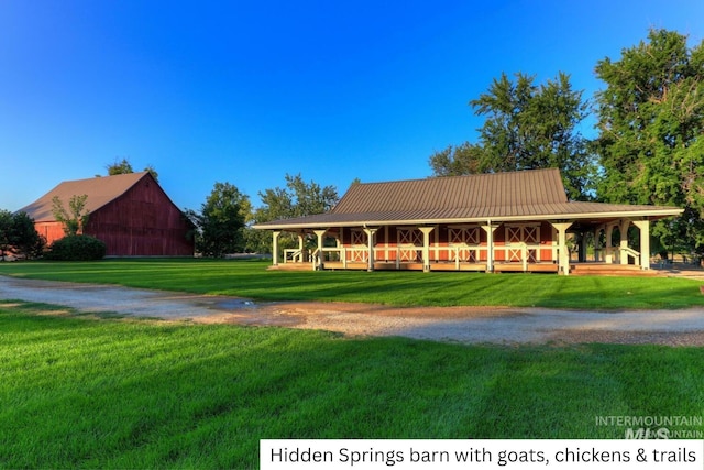 11684 N 23rd Ave, Boise, ID 83714 - farmhouse-style home featuring covered porch, a front lawn, and metal roof